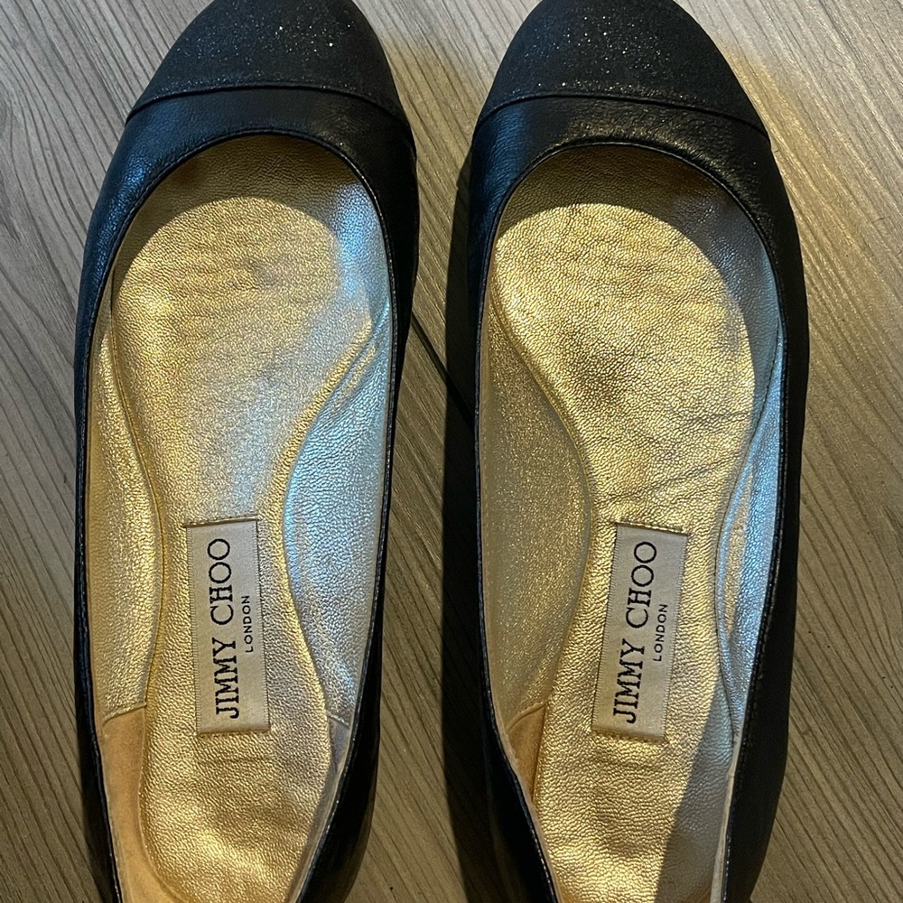 Jimmy Choo Black and Gold Flats